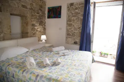 Letto o letti in una camera di Pietra Viva