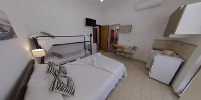 Letto o letti in una camera di Stella Maris Marzamemi Apartments