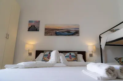 Letto o letti in una camera di Stella Maris Marzamemi Apartments