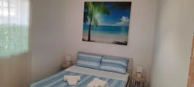 Letto o letti in una camera di Borgo Arenella