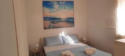 Letto o letti in una camera di Borgo Arenella