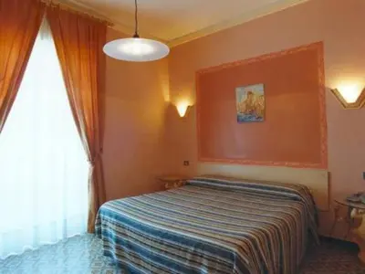 Letto o letti in una camera di Hotel Scala Greca