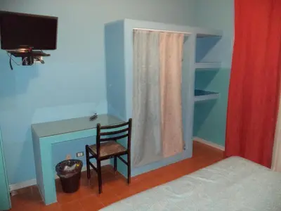 Letto o letti in una camera di Hotel Scala Greca