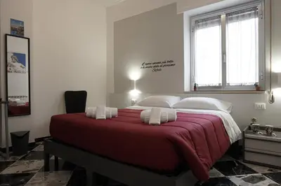 Letto o letti in una camera di Al Teatro Greco