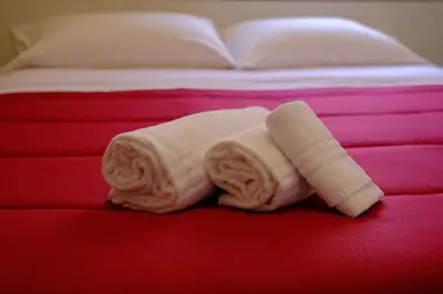 Letto o letti in una camera di Al Teatro Greco