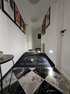 Letto o letti in una camera di Al Teatro Greco