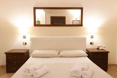 Letto o letti in una camera di Villa Chiara