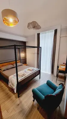 Letto o letti in una camera di Cuore Mio B&b