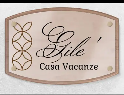 Certificato, attestato, insegna o altro documento esposto da Casa Gilè