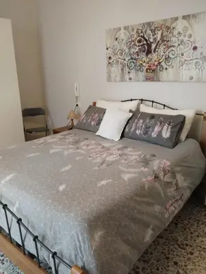 Letto o letti in una camera di Casa Gilè