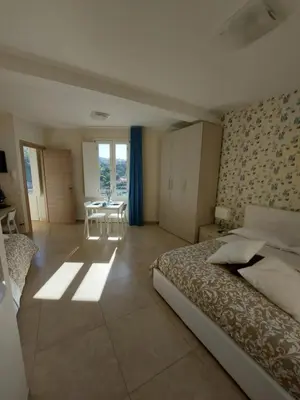 Letto o letti in una camera di Oikos - Ragusa Ibla