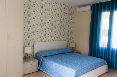 Letto o letti in una camera di Oikos - Ragusa Ibla