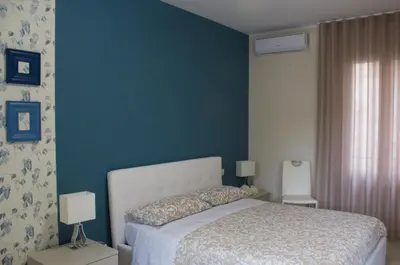 Letto o letti in una camera di Oikos - Ragusa Ibla