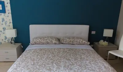 Letto o letti in una camera di Oikos - Ragusa Ibla