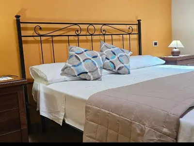 Letto o letti in una camera di Casa delle Cicale