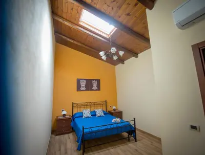 Letto o letti in una camera di Casa delle Cicale