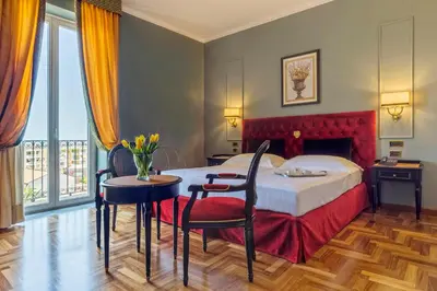 Letto o letti in una camera di Grand Hotel Villa Politi