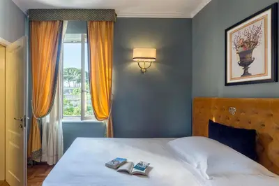 Letto o letti in una camera di Grand Hotel Villa Politi