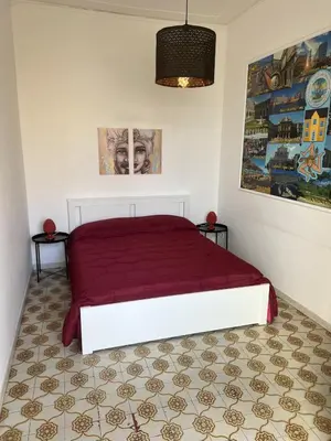 Letto o letti in una camera di Mary's Center House