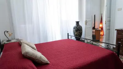 Letto o letti in una camera di Mary's Center House