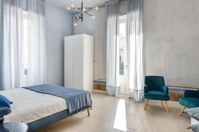 Letto o letti in una camera di Ortigia Amazing Apartment