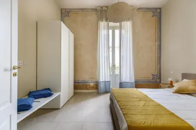 Letto o letti in una camera di Ortigia Amazing Apartment