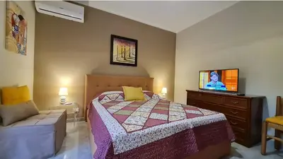Letto o letti in una camera di Casa Vacanze La Melagrana