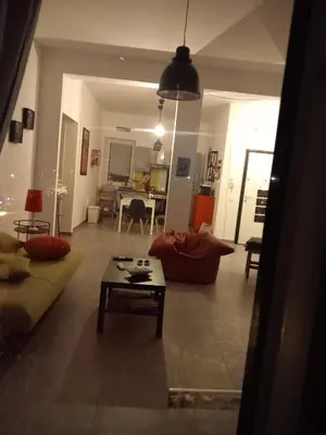 Area soggiorno di Lo scorcio della Neapolis Accogliente appartamento pressi parco Neapolis