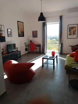 Area soggiorno di Lo scorcio della Neapolis Accogliente appartamento pressi parco Neapolis