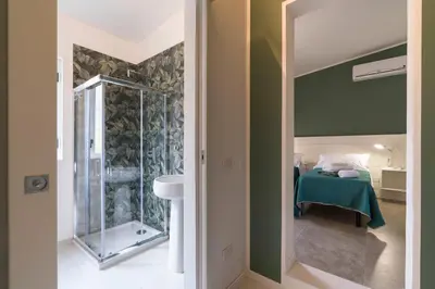 Letto o letti in una camera di Villa Mara
