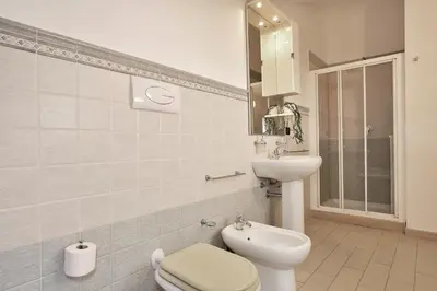 Bagno di Attico Vista Mare e Piscina