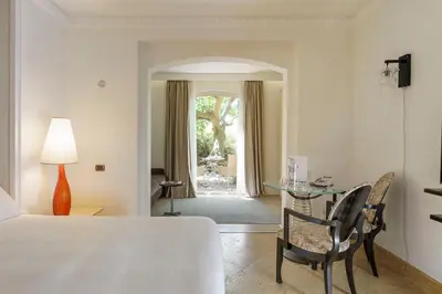 Letto o letti in una camera di Romano Palace Luxury Hotel
