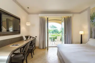 Letto o letti in una camera di Romano Palace Luxury Hotel