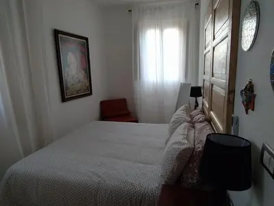 Letto o letti in una camera di CASA ALABO