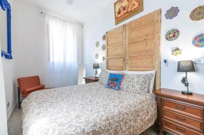 Letto o letti in una camera di CASA ALABO