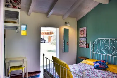 Letto o letti in una camera di Casa vacanze FELICI IN 2 - Santa Maria del Focallo - Ispica