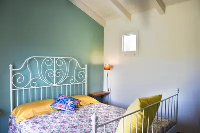 Letto o letti in una camera di Casa vacanze FELICI IN 2 - Santa Maria del Focallo - Ispica