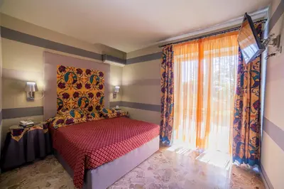 Letto o letti in una camera di Hotel Villamare