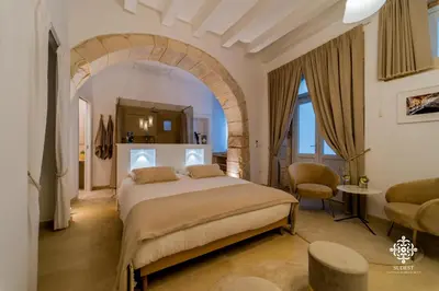 Letto o letti in una camera di Casa Tal - Exclusive home in Ortigia