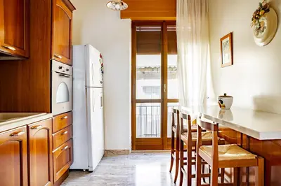 Cucina o angolo cottura di Ortigia Seafront Apartment by Wonderful Italy