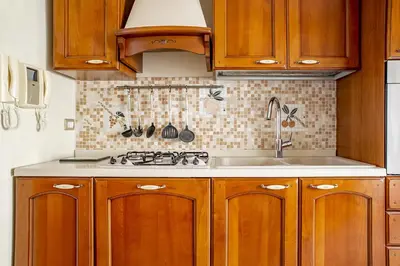 Cucina o angolo cottura di Ortigia Seafront Apartment by Wonderful Italy