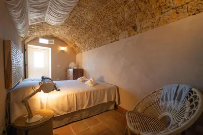 Letto o letti in una camera di GuestHost - Il Dammuso di Ortigia - Lovely Sea View Apartment