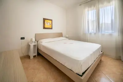 Letto o letti in una camera di Villa Danilo - Sicilia Vacanza
