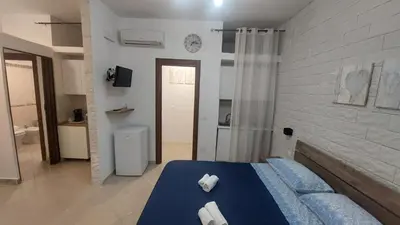 Letto o letti in una camera di Baglieri appartament