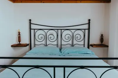 Letto o letti in una camera di Cuore di Ognina - Appartamenti vista mare