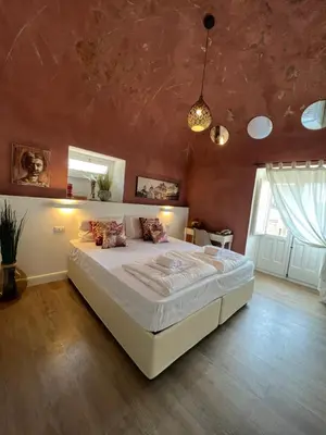 Letto o letti in una camera di Bibike