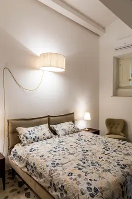 Letto o letti in una camera di Casa Gioconda