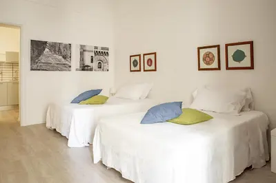 Letto o letti in una camera di Mirabella Apartment in Ortigia by Wonderful Italy