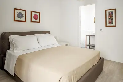 Letto o letti in una camera di Mirabella Apartment in Ortigia by Wonderful Italy