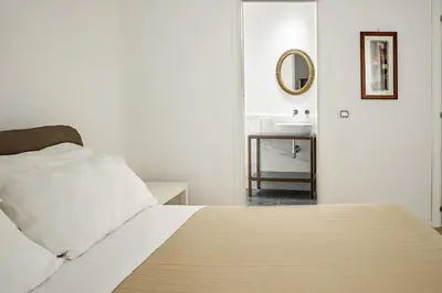 Letto o letti in una camera di Mirabella Apartment in Ortigia by Wonderful Italy